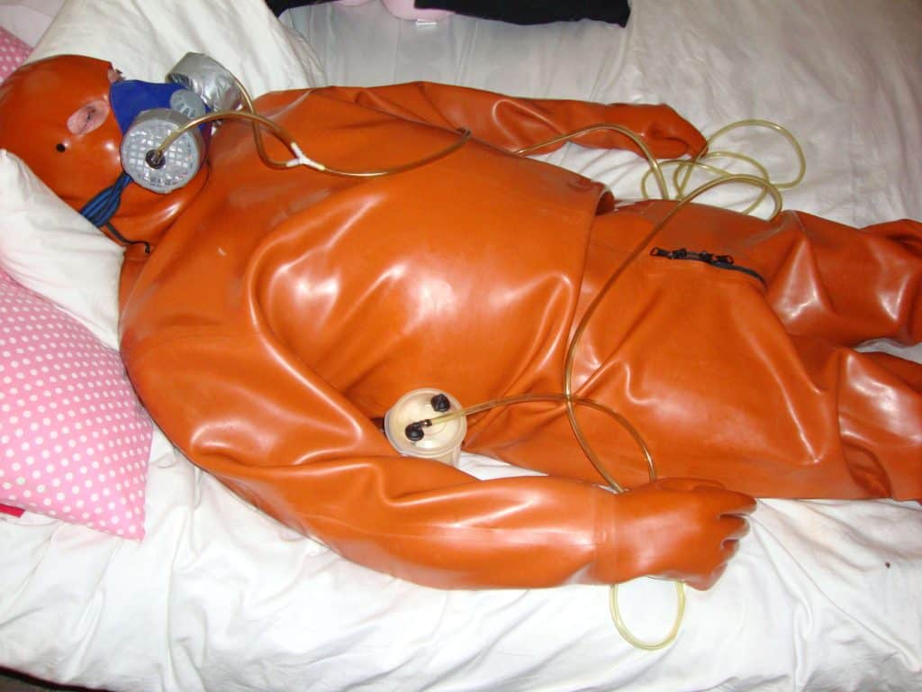 slave in rubber suit, bdsm slave in gas mask, bdsm pictures