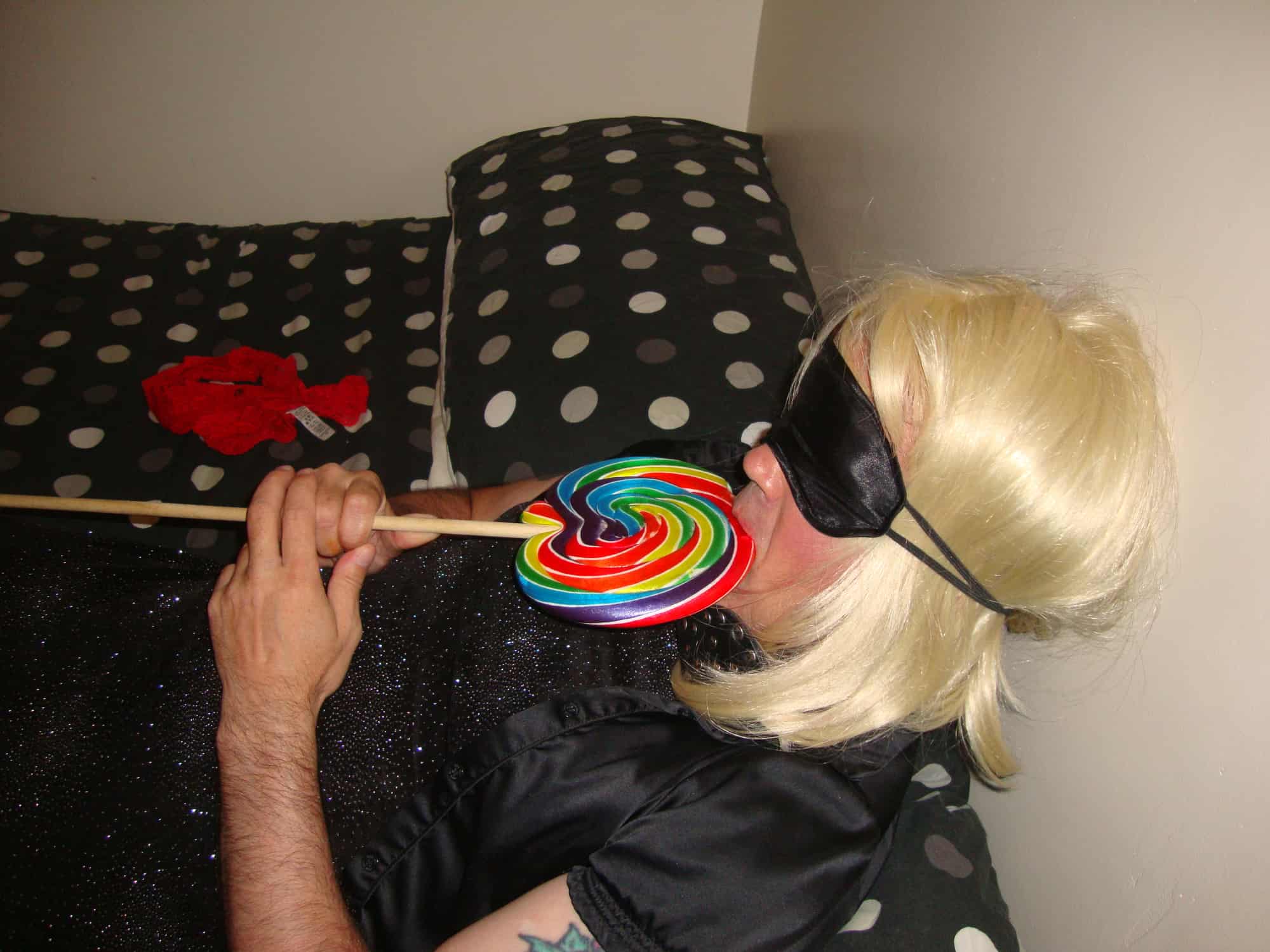 Licking a lolly preparing for real cocks